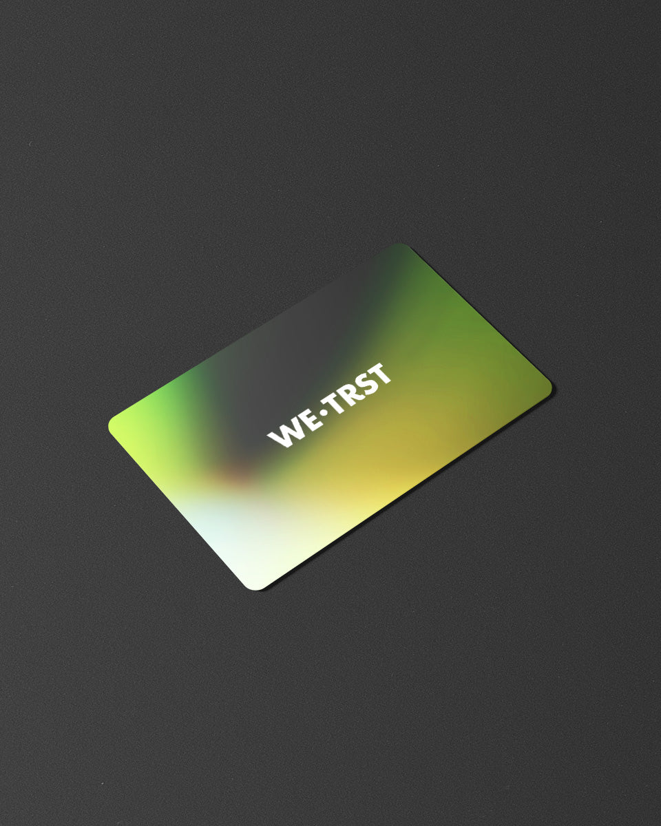 Leuchtend grüne und gelbe digitale Geschenkkarte von WE•TRST, perfekt für stilvolle Geschenke.