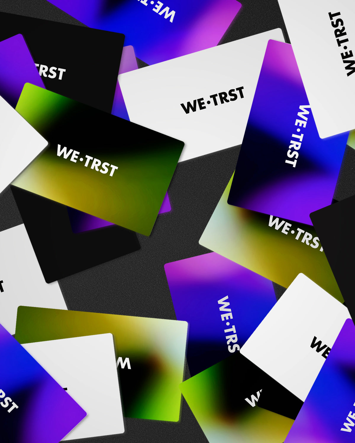 Kollektion digitaler WE•TRST Geschenkkarten in verschiedenen Farben und Designs, ideal für jeden Anlass.